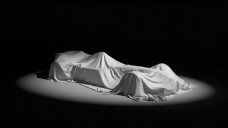 跑车白布遮住的F1赛车图片